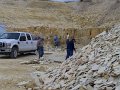 No 75 Warfield Fossils, Wyoming. Steve and Diane foreground with the fossil producing layer in the background. Notice the large rubble pile on the right. 